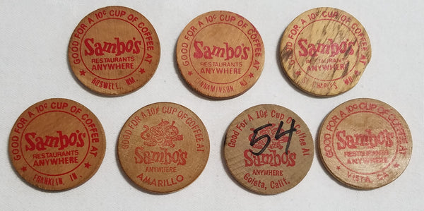 LOT OF 7 VINTAGE SAMBO RESTAURANT COFFEE WOODEN NICKEL TOKENS--2 WITH TIGER--VARIOUS US CITIES!